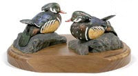 Wood Ducks on a Rock and a Base
